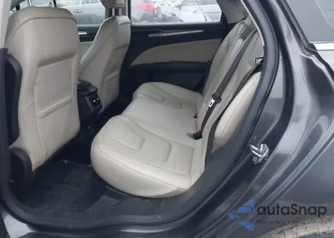 2016 Ford Fusion Titanium z USA, uszkodzony, nr VIN 3FA6P0K96GR334311